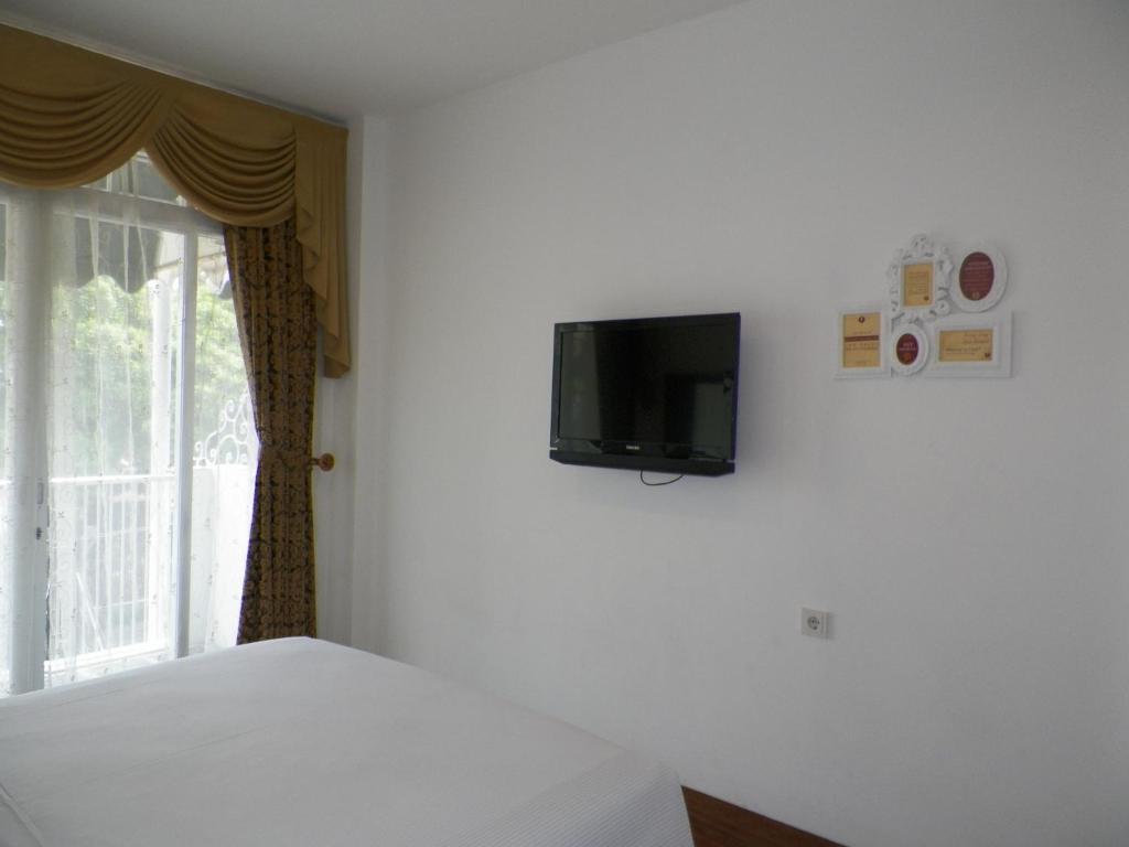 The Victoria Guesthouse Бандунг Номер фото